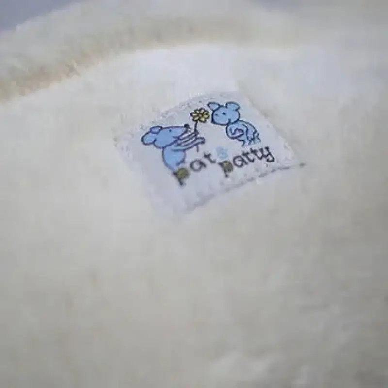 Bio Kuschelkissen Eisbär aus Baumwolle – Spelzfüllung, GOTS