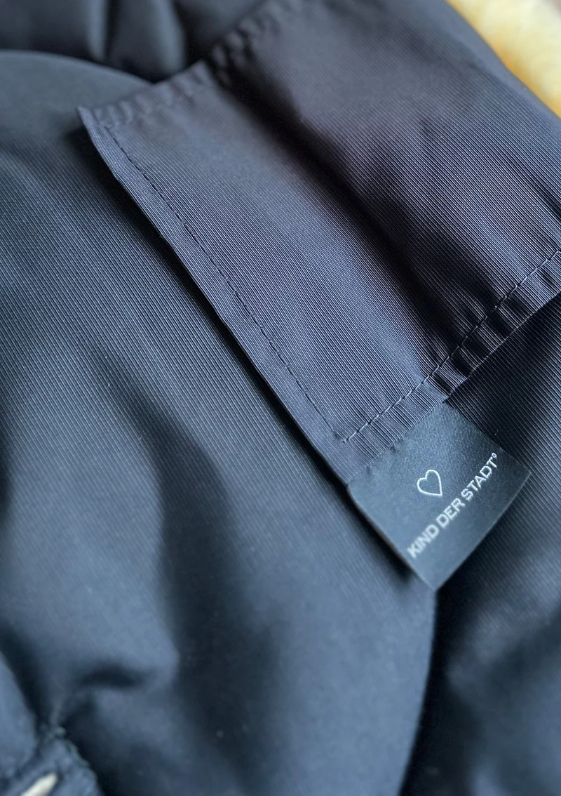 Premium Lammfell-Fußsack für Babywanne & Kinderautositz midnight black