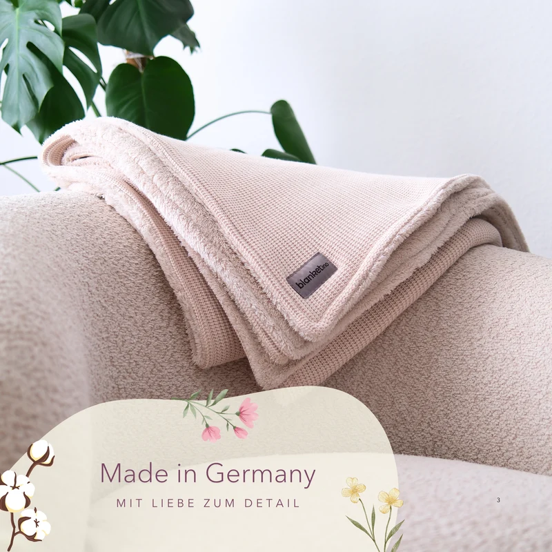 Kuscheldecke mit Baumwollstrick · Creme