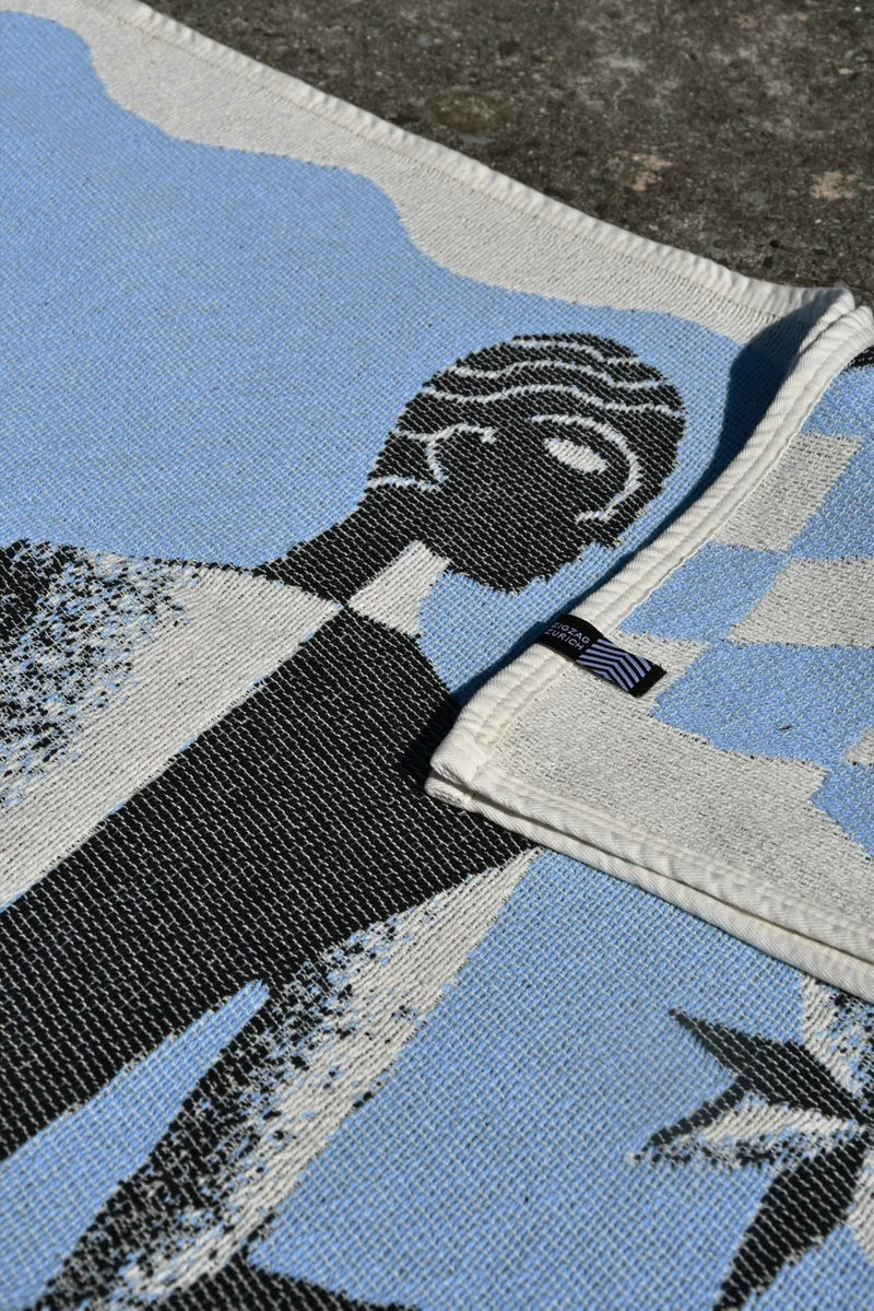 Cotton Beach Towel / Mini Blanket “Cosmic Man” by Raphael Greaves