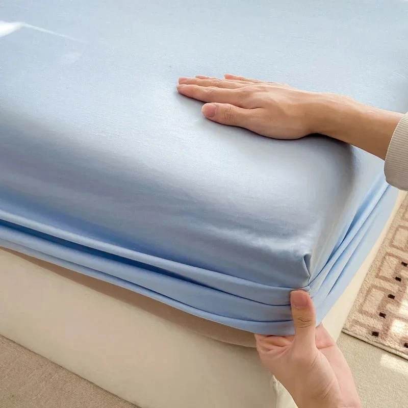 Hochwertiges Spannbettlaken aus Baumwolle mit Gummiband – erhältlich in den Größen Einzel-, Doppel-, Kingsize- und Queensize.