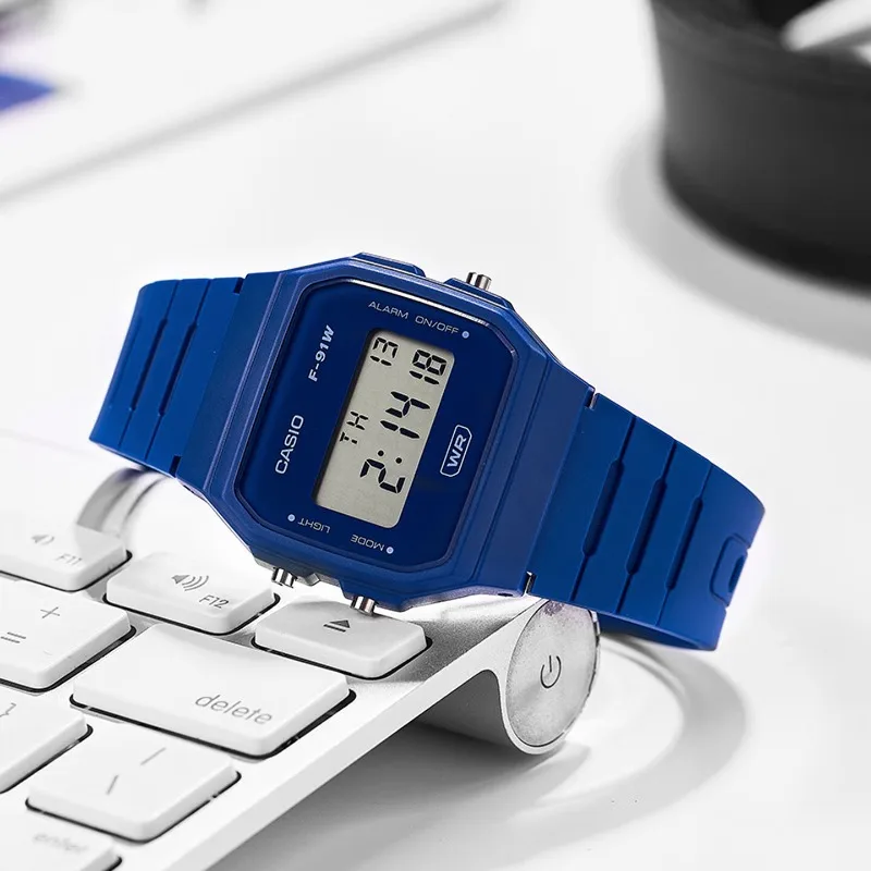 Casio F91W Retro-Wasserdichte Uhr - Modische, schlichte, kleine, quadratische elektronische Uhr mit LCD-Display