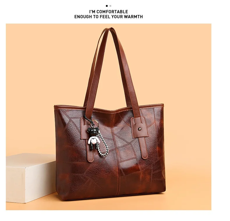 Trendige, geräumige Tragetasche für Damen – horizontale, quadratische Handtasche mit Reißverschluss, die über der Schulter getragen werden kann.