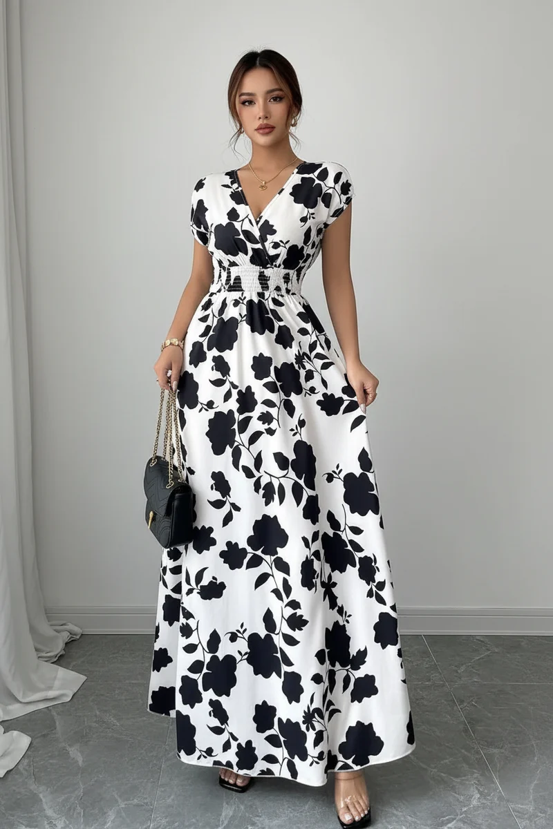 Verleihen Sie Ihrem Sommer-Look mit unserem Damen-Sommerkleid mit V-Ausschnitt das gewisse Etwas.