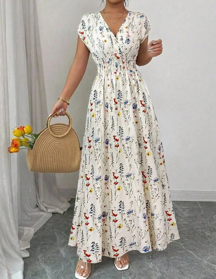 Verleihen Sie Ihrem Sommer-Look mit unserem Damen-Sommerkleid mit V-Ausschnitt das gewisse Etwas.