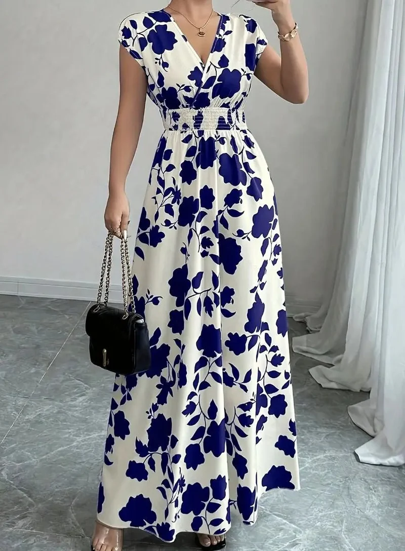 Verleihen Sie Ihrem Sommer-Look mit unserem Damen-Sommerkleid mit V-Ausschnitt das gewisse Etwas.